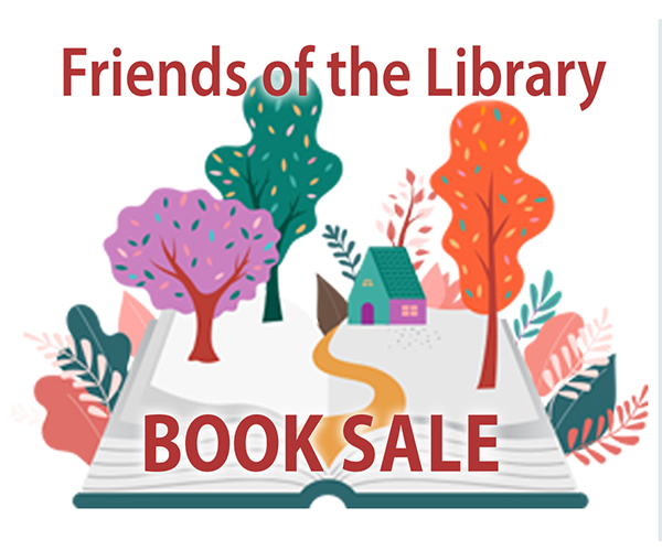 Friends of the Library book sale with an oversized book with a park scene